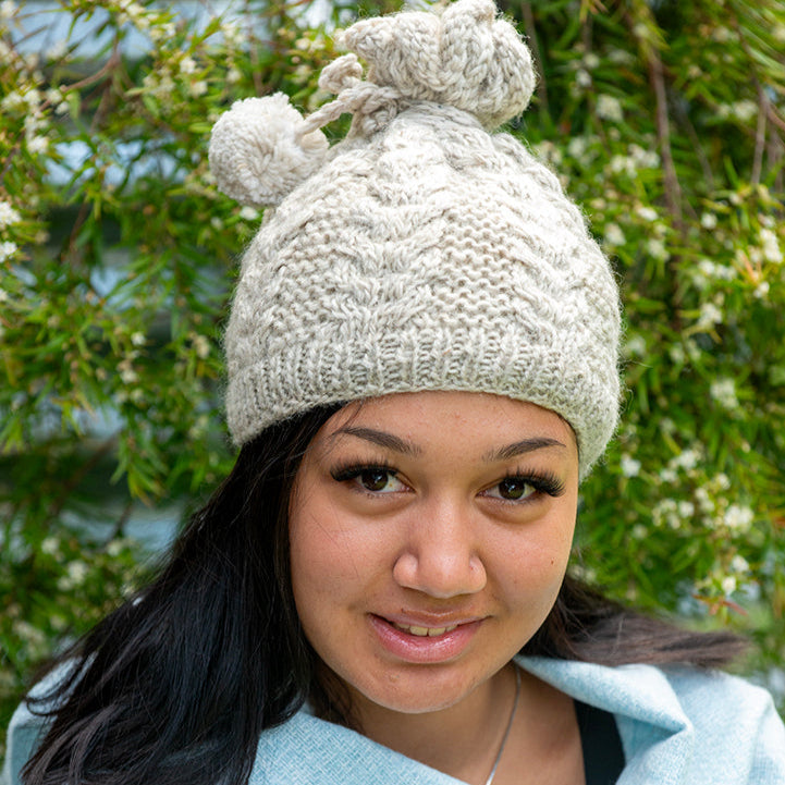 Women's Wool Pony Tail Beanie Fine Cable Knit in Cream