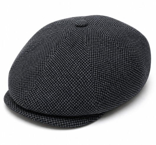 A dark gray and black houndstooth patterned newsboy cap with a structured crown and flat brim, shown on a clean white background.